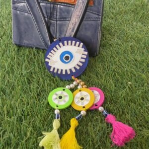 Handcrafted Evil Eye Charm by Mud Moves — Hero View