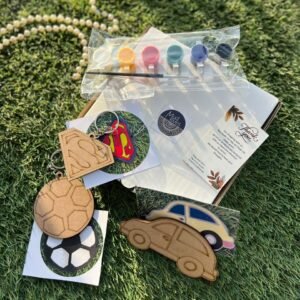 Handcrafted Football Car Superman Keychain by Mud Moves — Hero View
